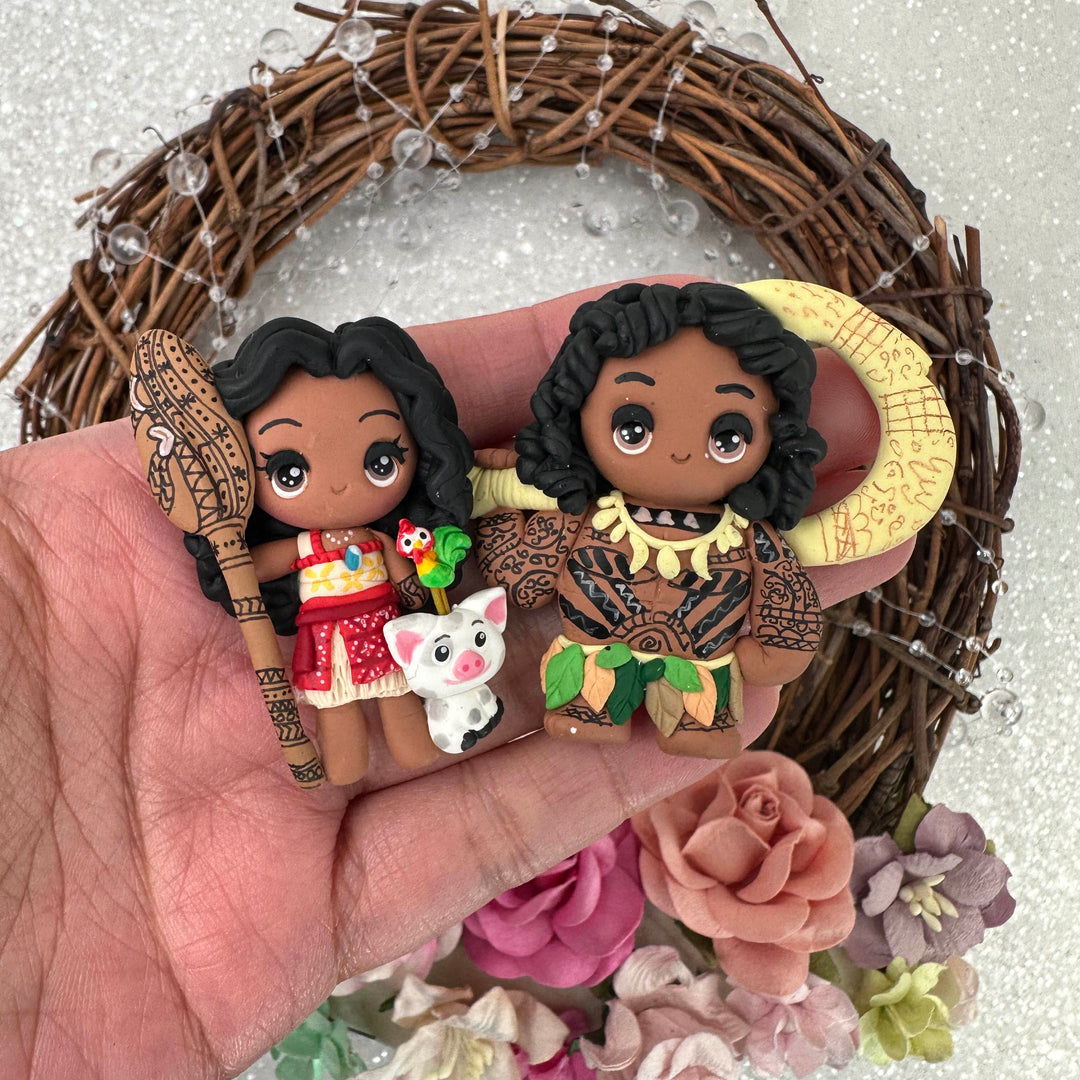 Cute Island Girl & Boy Embellishment Clay Bow Centre