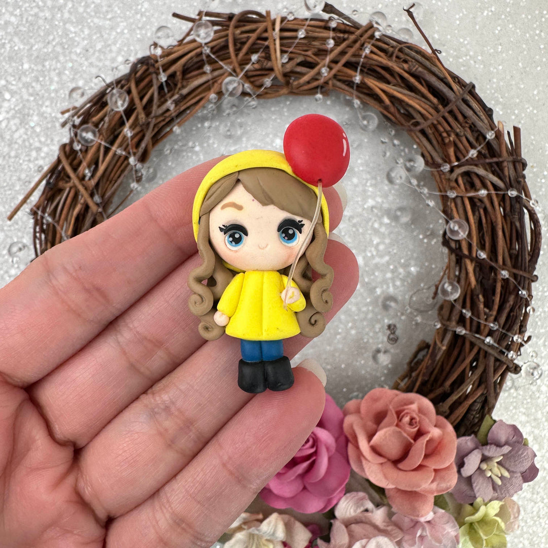 Cute Girl With Yellow Rain Coat Embellishment Clay Bow Centre