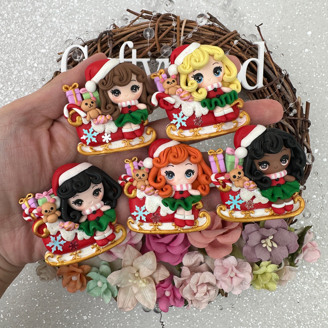 Christmas girl and sleigh - Embellishment Clay Bow Centre