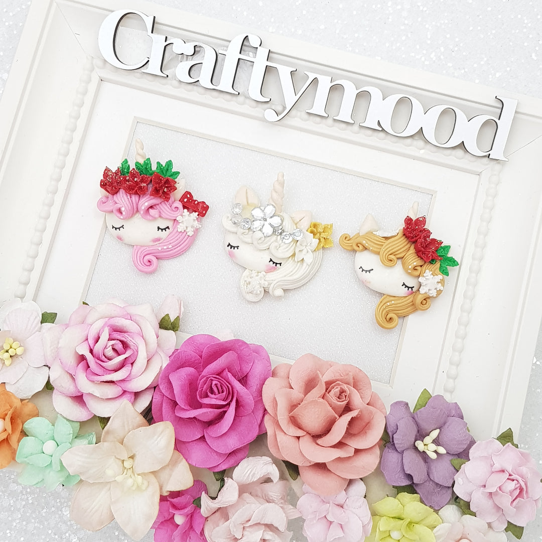 Winter flower unicorn head - Embellishment Clay Bow Centre