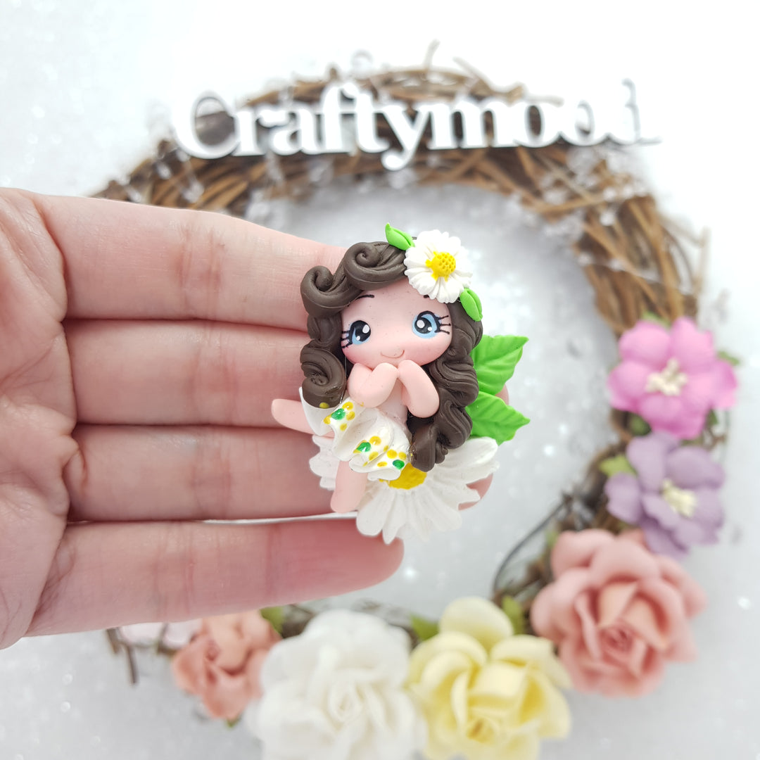 Little girl sit on Daisy flower - Embellishment Clay Bow Centre