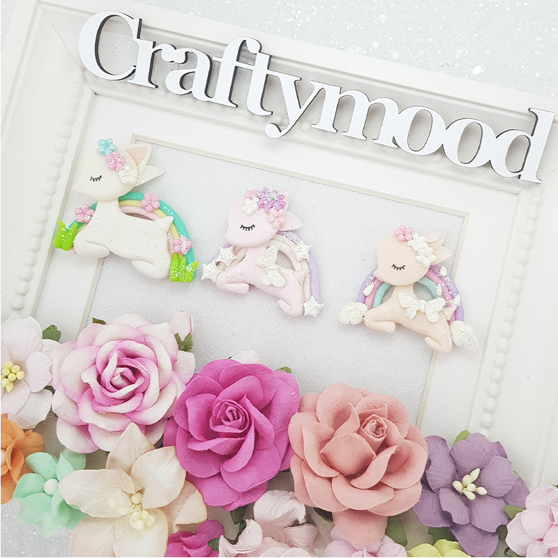Sleeping rainbow deer - Handmade Flatback Clay Bow Centre