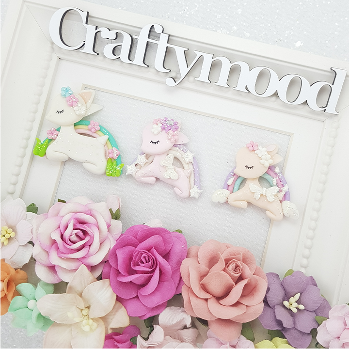 Sleeping rainbow deer - Handmade Flatback Clay Bow Centre