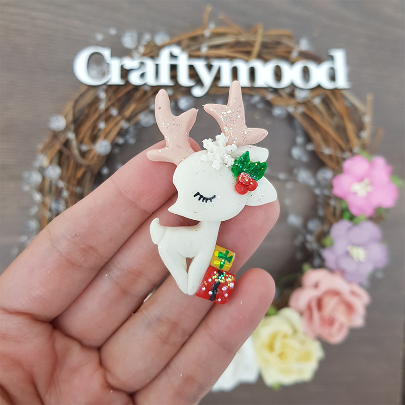Christmas reindeer and presents - Handmade Flatback Clay Bow Centre