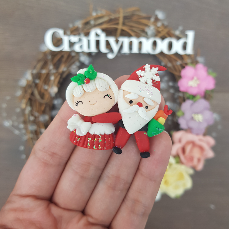 Christmas Santa couple - Embellishment Clay Bow Centre