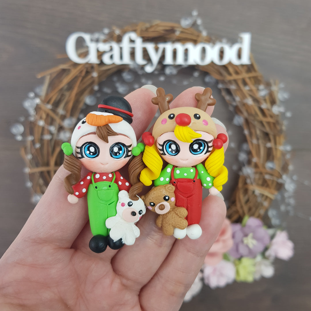 Dressing up girl snowman and reindeer - Embellishment Clay Bow Centre
