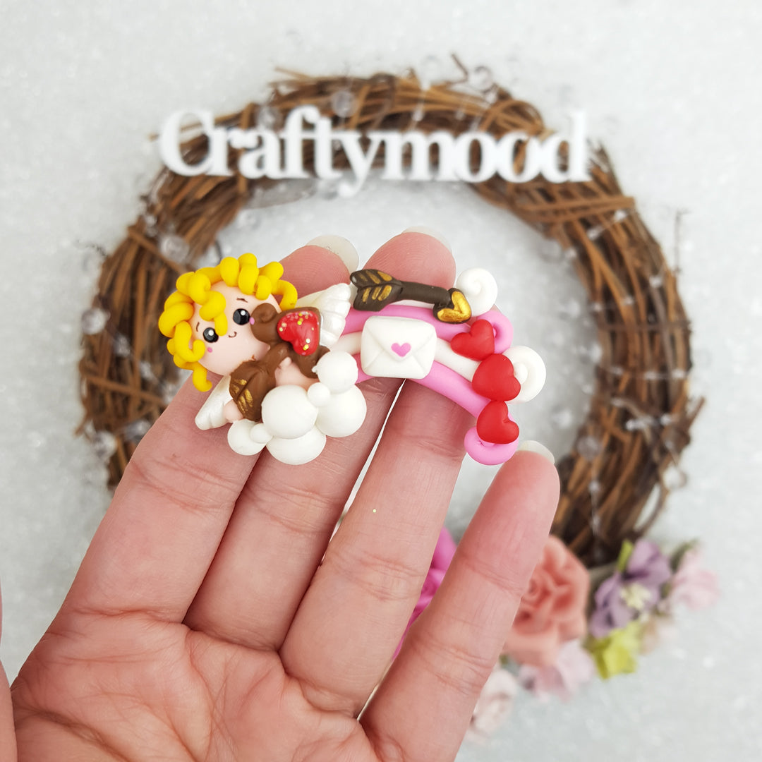 cupid rainbow - Embellishment Clay Bow Centre