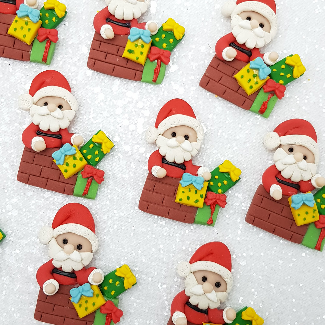 Santa with Christmas present - Embellishment Clay Bow Centre