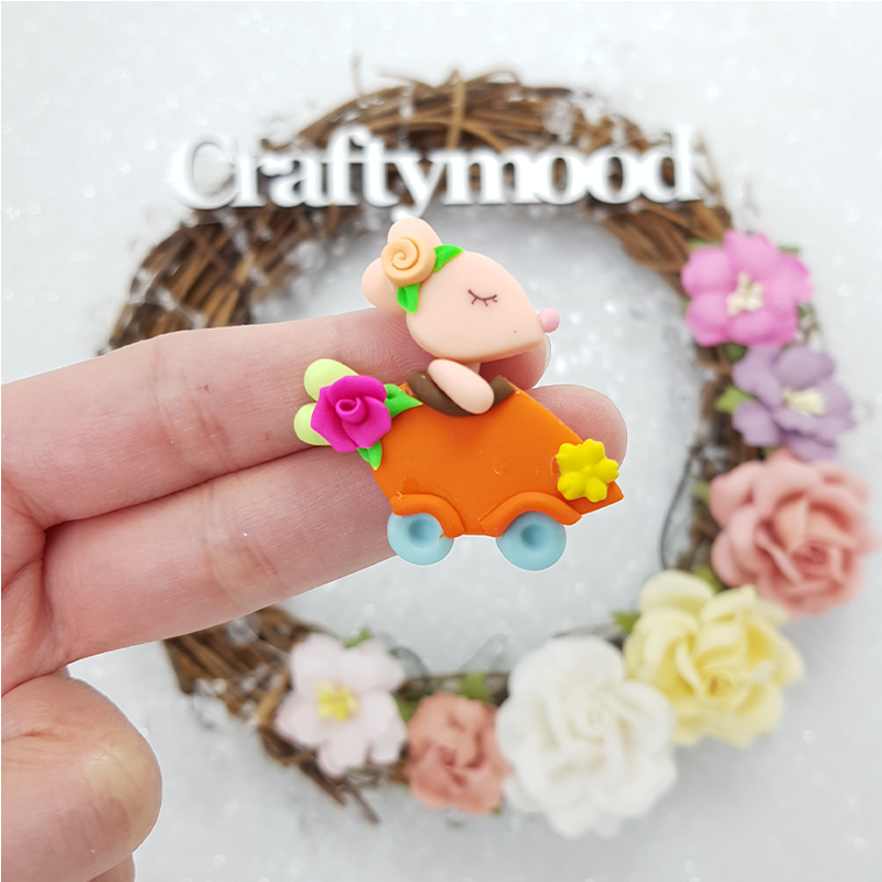 Bunny riding carrot - Handmade Flatback Clay Bow Centre