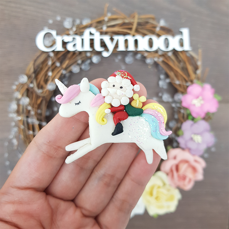Santa and white rainbow unicorn - Handmade Flatback Clay Bow Centre
