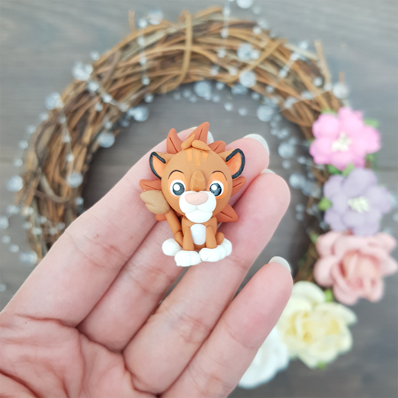 Young lion - Handmade Flatback Clay Bow Centre