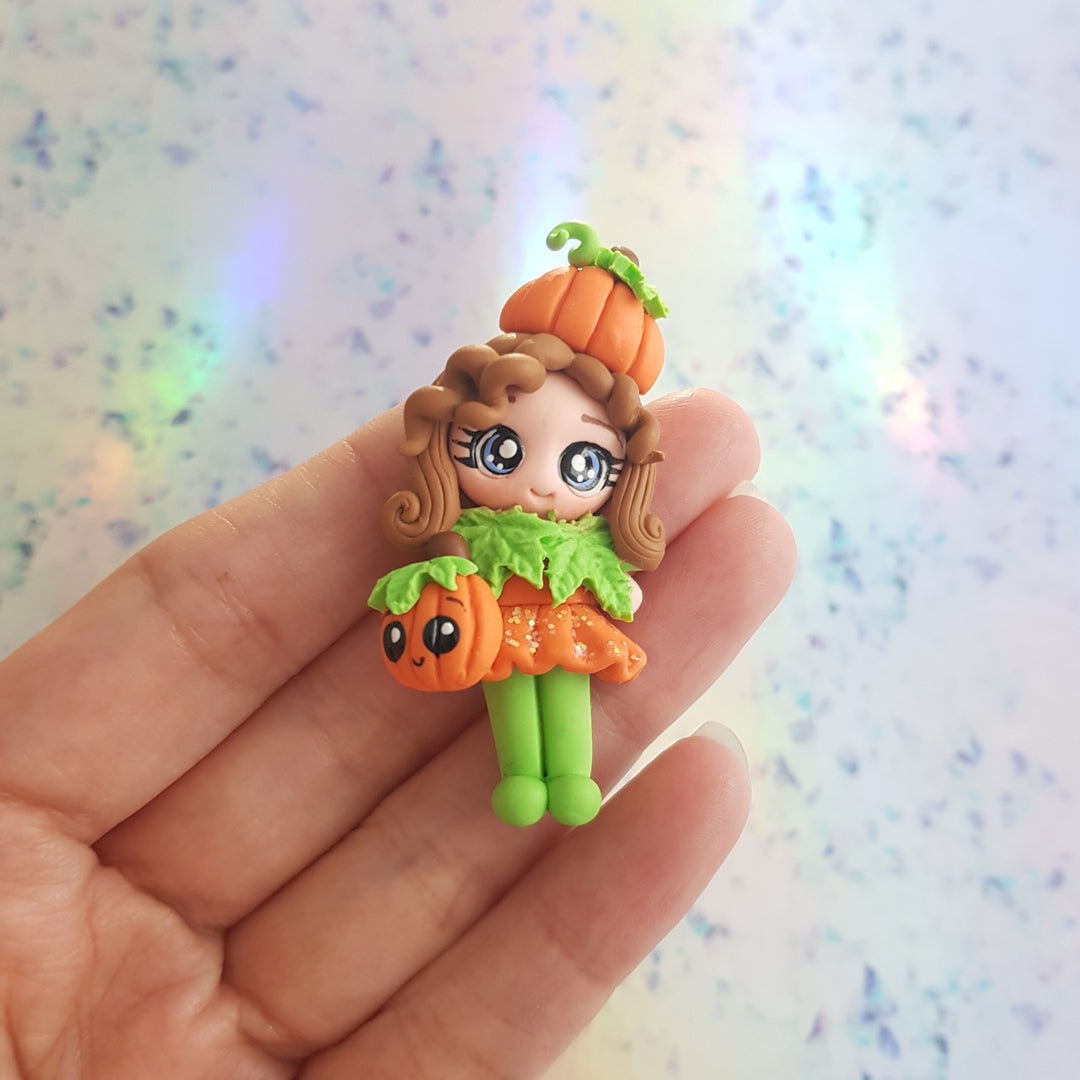 Orange pumpkin girl - Handmade Flatback Clay Bow Centre