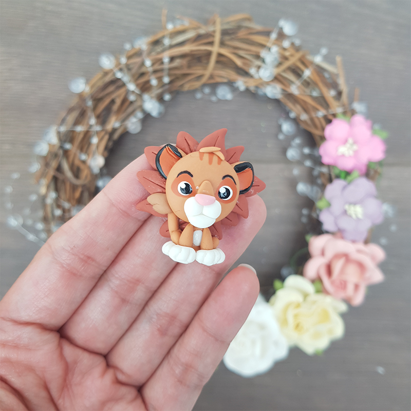 Young lion - Handmade Flatback Clay Bow Centre
